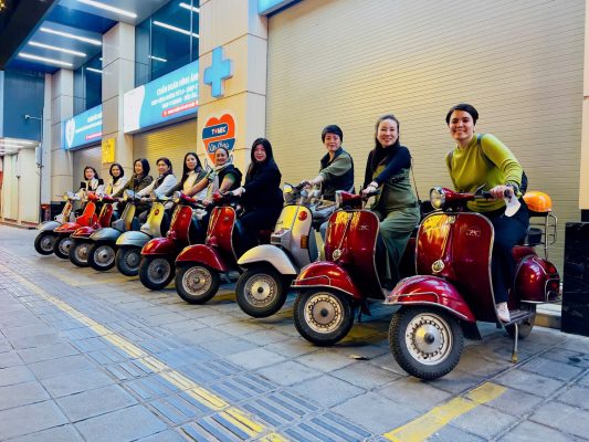 Hop on a Vespa and uncover the soul of Hanoi at night, from lit-up boulevards to hidden alley eateries.